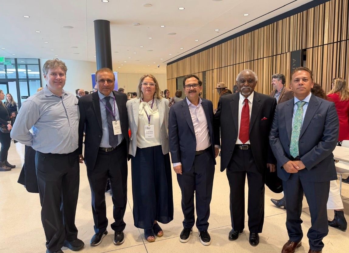 Bilal Anwar with delegates at a conference reception
