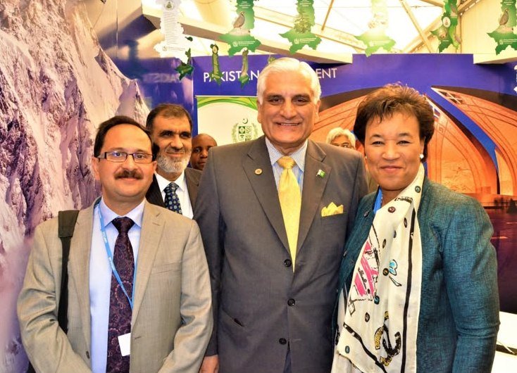 Bilal Anwar with colleagues at the Pakistan Pavilion during the 2016 climate conference